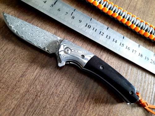 Damascus VG-10 Stainless Steel folding knife, RAZOR Sharp, EBONY handle scales, bolster engraved.