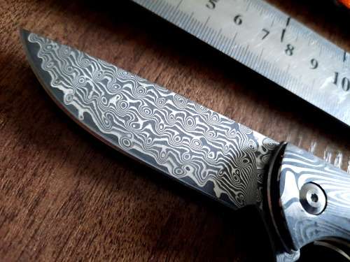 Damascus VG-10 Stainless Steel folding knife, RAZOR Sharp, EBONY handle scales, bolster engraved.