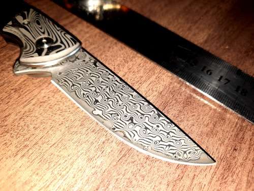 Damascus VG-10 Stainless Steel folding knife, RAZOR Sharp, EBONY handle scales, bolster engraved.