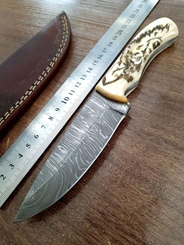 Handmade Damascus steel HUNTING  knife with Camel Bone handle scales Wolf engraved,