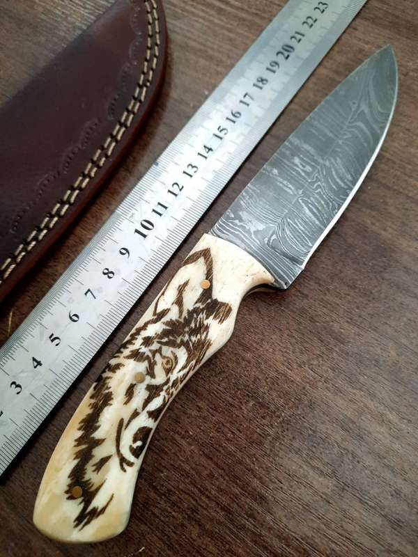 Handmade Damascus steel HUNTING  knife with Camel Bone handle scales Wolf engraved,