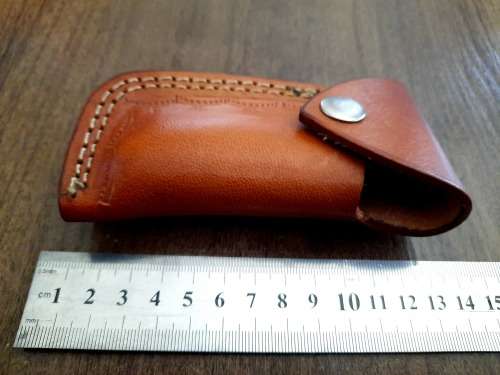 Handmade Damascus steel folding knife with Epoxy Resin handle scales.