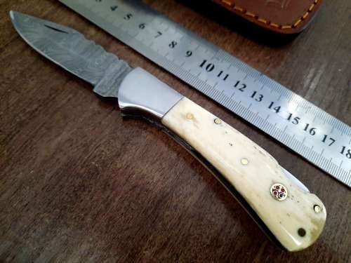 Handmade Damascus steel folding knife w Camel Bone Handle Scales. New stock !!