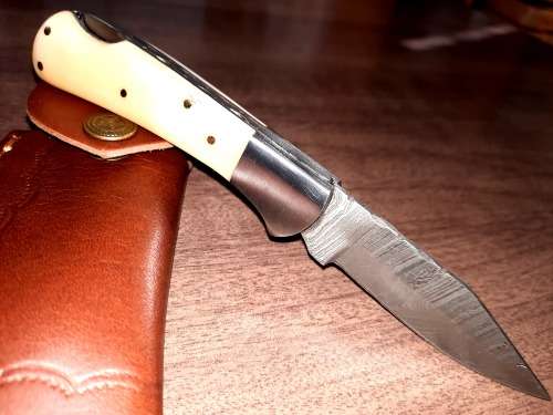 Handmade Damascus steel folding knife w Camel Bone Handle Scales. New stock !!