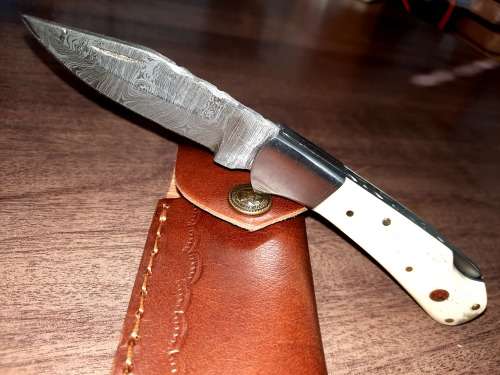 Handmade Damascus steel folding knife w Camel Bone Handle Scales. New stock !!
