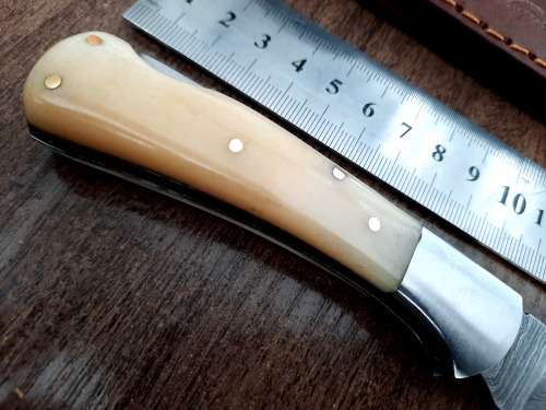 Handmade Damascus steel folding knife w Camel Bone Handle Scales. New stock !!