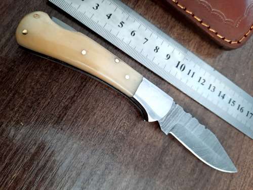 Handmade Damascus steel folding knife w Camel Bone Handle Scales. New stock !!