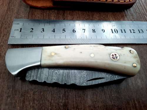 Handmade Damascus steel folding knife w Camel Bone Handle Scales. New stock !!