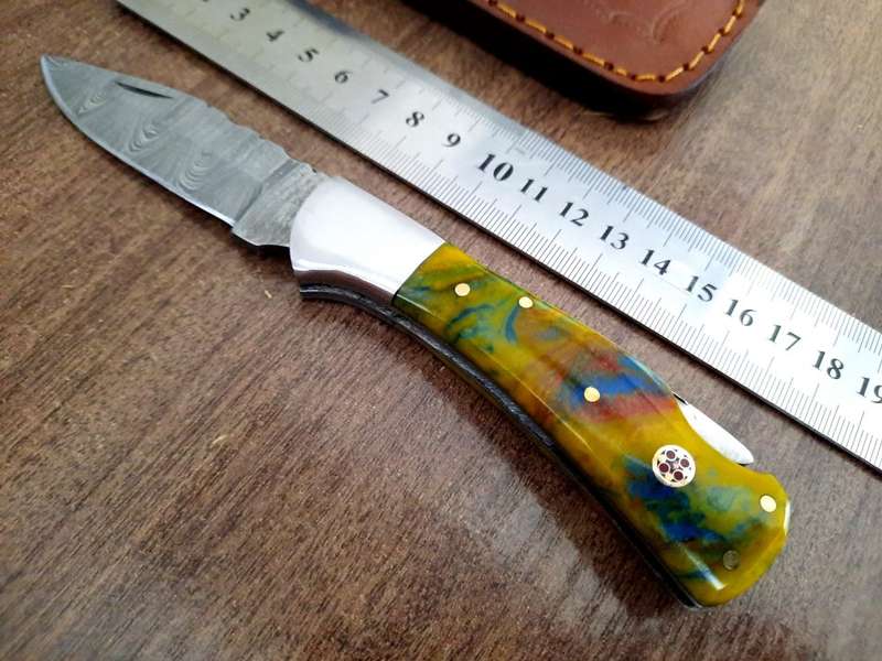 Handmade Damascus steel folding knife with Epoxy Resin handle scales. X-MAS SPECIAL PRICE !!!!