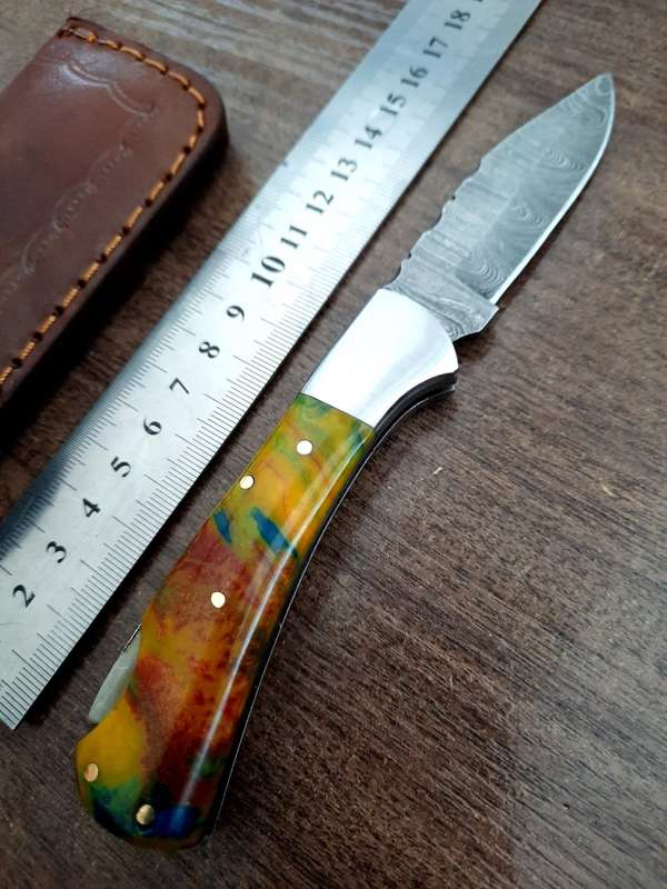 Handmade Damascus steel folding knife with Epoxy Resin handle scales. X-MAS SPECIAL PRICE !!!!