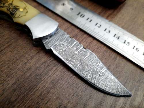 Handmade Damascus steel folding knife w Camel Bone Handle Scales. New stock !!