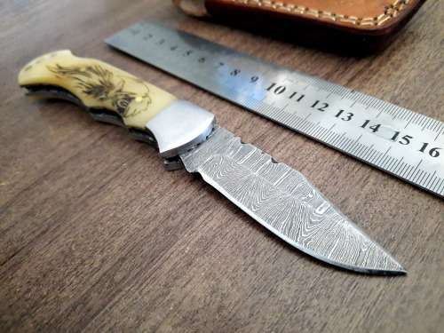 Handmade Damascus steel folding knife w Camel Bone Handle Scales. New stock !!