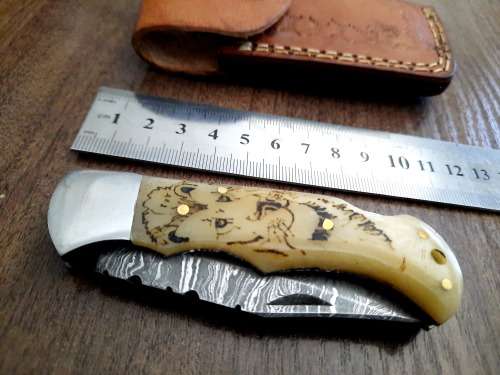 Handmade Damascus steel folding knife w Camel Bone Handle Scales. New stock !!