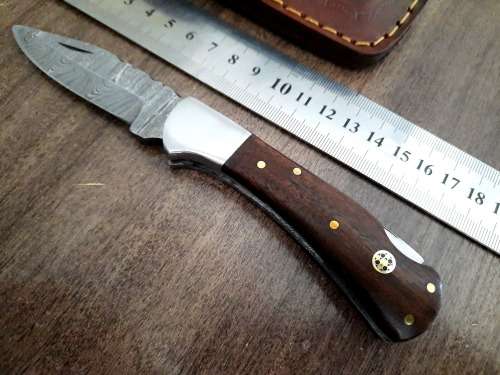 Handmade Damascus steel folding knife w Wooden Handle Scales. New stock !!