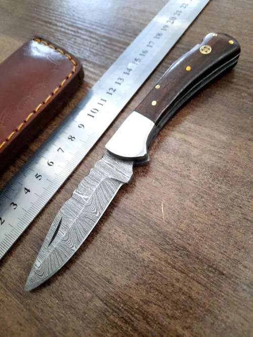 Handmade Damascus steel folding knife w Wooden Handle Scales. New stock !!