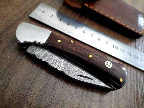 Handmade Damascus steel folding knife w Wooden Handle Scales. New stock !!