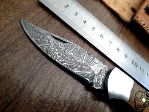Handmade Damascus steel folding knife w Wooden Handle Scales. New stock !! LEATHER Pouch is BAD.