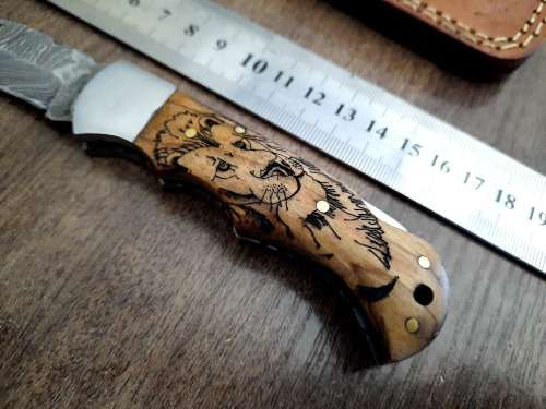 Handmade Damascus steel folding knife w Wooden Handle Scales. New stock !! LEATHER Pouch is BAD.