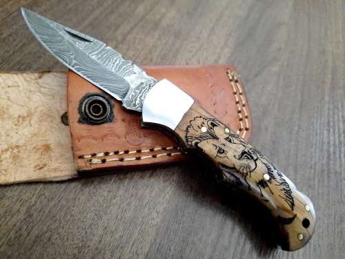 Handmade Damascus steel folding knife w Wooden Handle Scales. New stock !! LEATHER Pouch is BAD.