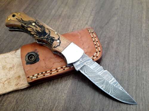 Handmade Damascus steel folding knife w Wooden Handle Scales. New stock !! LEATHER Pouch is BAD.