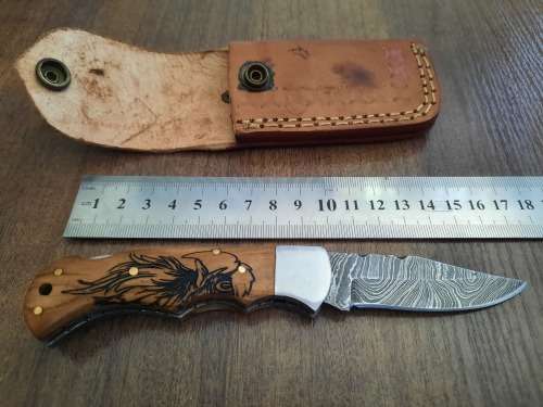 Handmade Damascus steel folding knife w Wooden Handle Scales. New stock !! LEATHER Pouch is BAD.