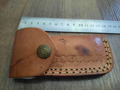 Handmade Damascus steel folding knife w Wooden Handle Scales. New stock !! LEATHER Pouch is BAD.