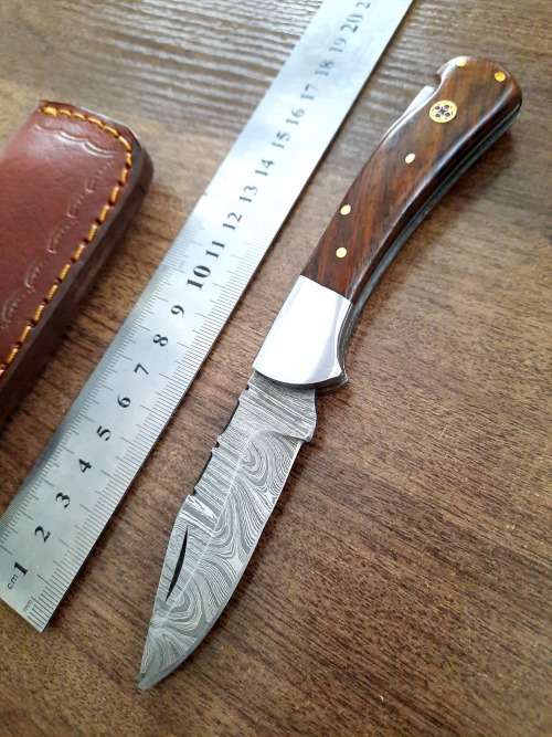 Handmade Damascus steel folding knife w Wooden Handle Scales. New stock !!