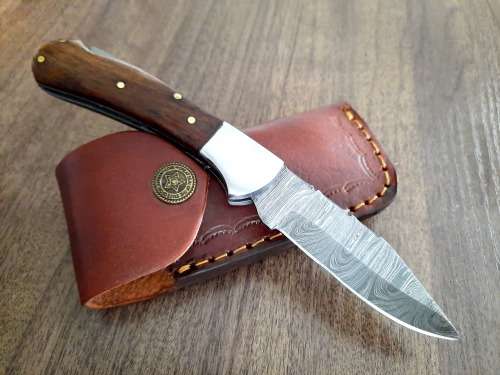 Handmade Damascus steel folding knife w Wooden Handle Scales. New stock !!