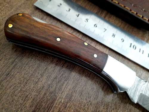 Handmade Damascus steel folding knife w Wooden Handle Scales. New stock !!