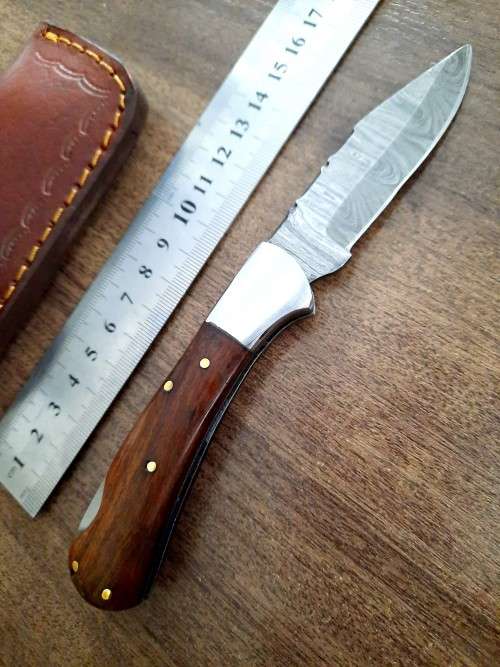 Handmade Damascus steel folding knife w Wooden Handle Scales. New stock !!