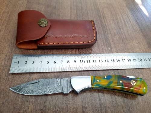 Handmade Damascus steel folding knife w Epoxy Handle Scales. New stock !!