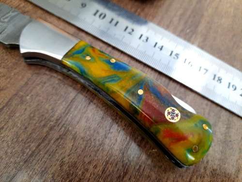 Handmade Damascus steel folding knife w Epoxy Handle Scales. New stock !!