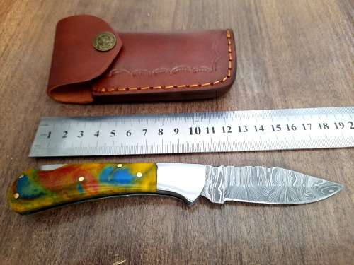 Handmade Damascus steel folding knife w Epoxy Handle Scales. New stock !!