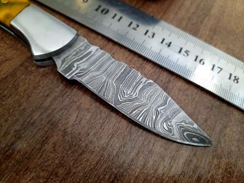Handmade Damascus steel folding knife w Epoxy Handle Scales. New stock !!