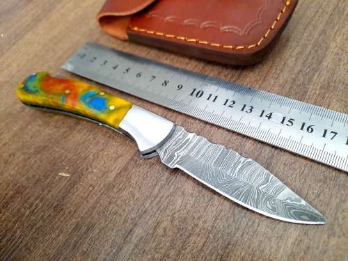 Handmade Damascus steel folding knife w Epoxy Handle Scales. New stock !!