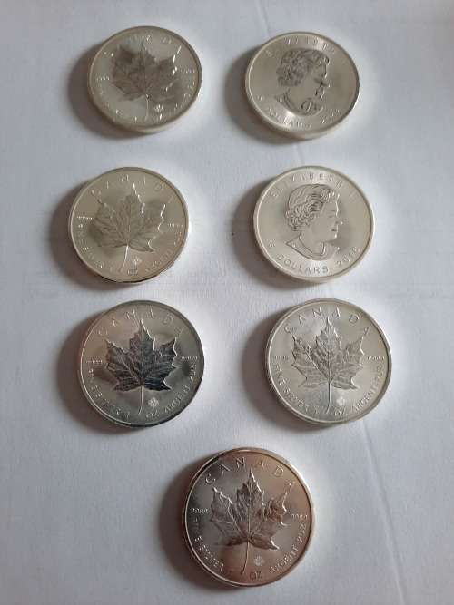 1 OZ Silver Canadian Maple Coin, 7 available,  PURE SILVER !!! BID PER COIN !!!