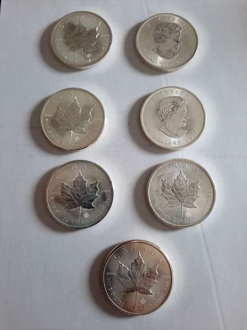 1 OZ Silver Canadian Maple Coin, 7 available,  PURE SILVER !!! BID PER COIN !!!