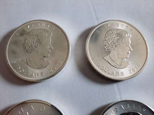 1 OZ Silver Canadian Maple Coin, 7 available,  PURE SILVER !!! BID PER COIN !!!