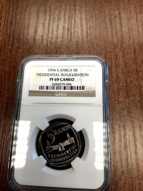 Mandela Presidential Inauguration PF69 CAMEO, very scarce grade, complete your collection today.