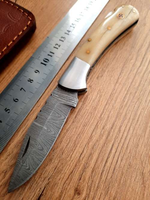 Handmade Damascus steel folding knife w Camel Bone Handle Scales. New stock !!