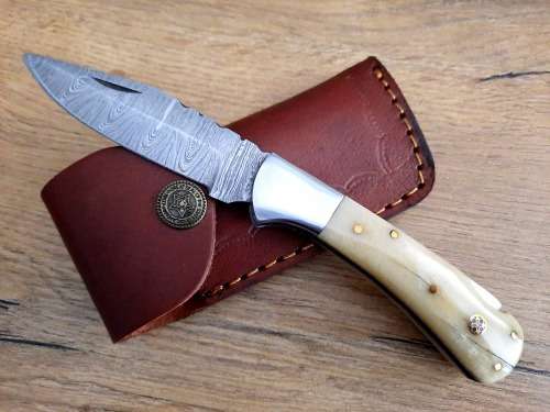 Handmade Damascus steel folding knife w Camel Bone Handle Scales. New stock !!