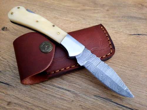 Handmade Damascus steel folding knife w Camel Bone Handle Scales. New stock !!