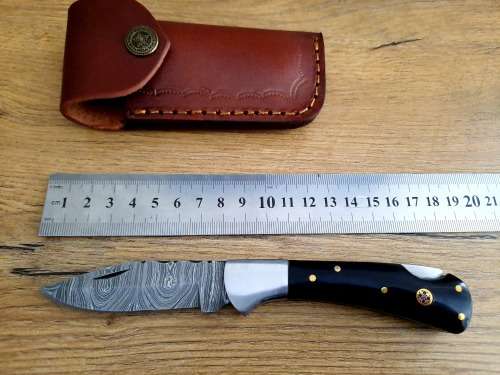 Handmade Damascus steel folding knife w  Bull Horn Handle Scales. New stock !!