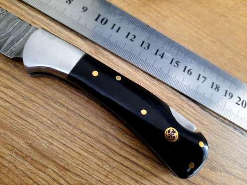 Handmade Damascus steel folding knife w  Bull Horn Handle Scales. New stock !!
