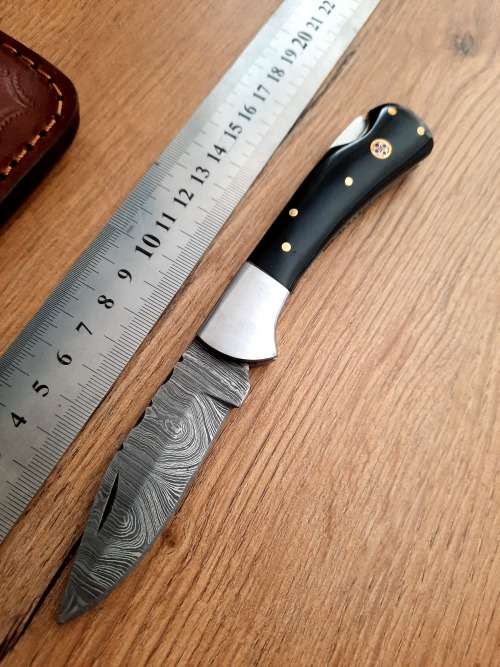 Handmade Damascus steel folding knife w  Bull Horn Handle Scales. New stock !!
