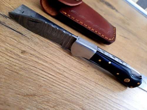 Handmade Damascus steel folding knife w  Bull Horn Handle Scales. New stock !!