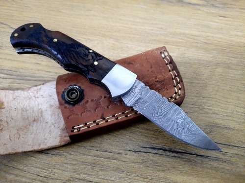 Handmade Damascus steel folding knife w Wooden Handle Scales. New stock !! Leather pouch is bad.