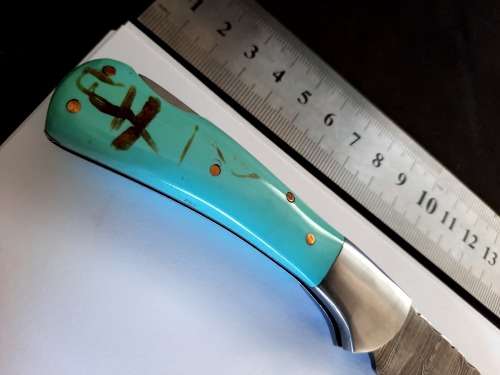 Handmade Damascus steel folding knife w Epoxy Resin Handle Scales. New stock !!