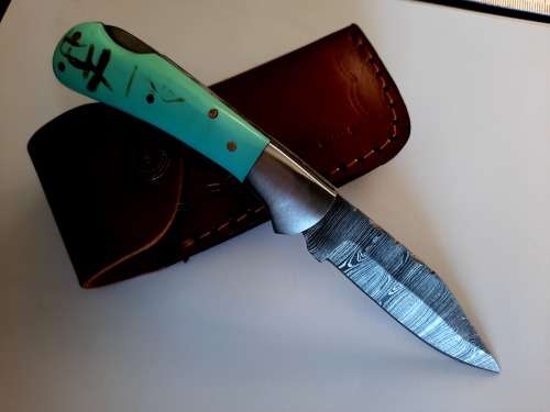 Handmade Damascus steel folding knife w Epoxy Resin Handle Scales. New stock !!