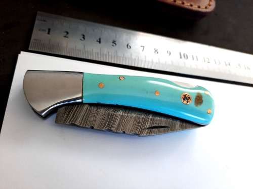 Handmade Damascus steel folding knife w Epoxy Resin Handle Scales. New stock !!